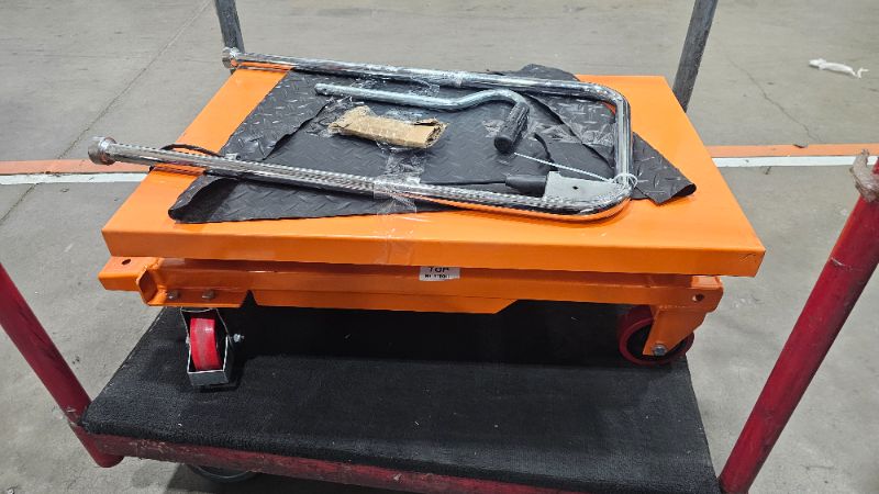 Photo 1 of ***PARTS ONLY***VEVOR Hydraulic Lift Table Cart, 330lbs Load Capacity 50 Inch Lifting Height, Manual Single Scissor Lift Table with Non-Slip Pad and 4 Wheels, Hydraulic Scissor Cart for Material Handling, Orange