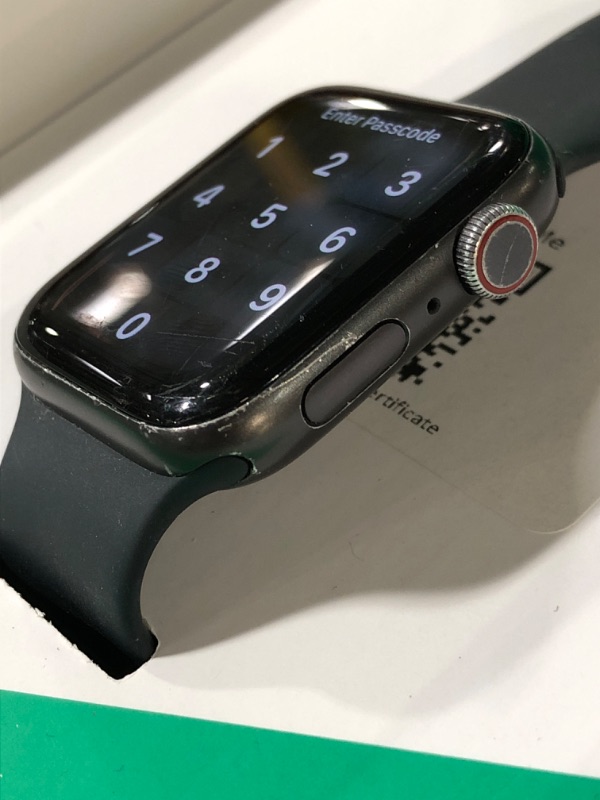 Photo 1 of **** see notes LOCKED ** Apple Watch Ultra [GPS + Cellular 49mm] Titanium Case with Midnight Ocean Band, One Size (Renewed Premium)