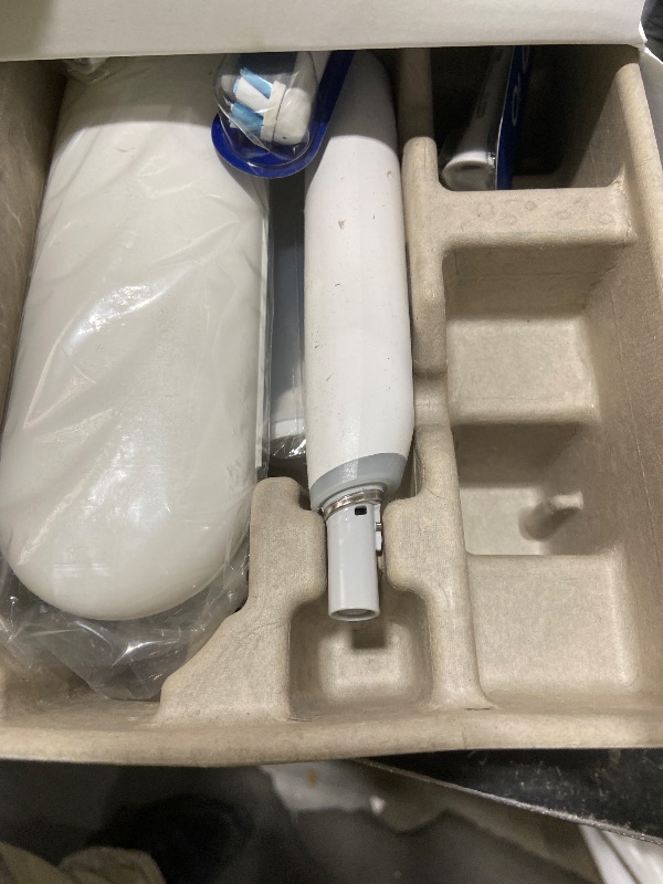 Photo 1 of Oral-B Rechargeable Electric Toothbrush, iO5 Limited Deep Clean & Whiten, 5 Cleaning Modes, Visual Pressure Sensor to Protect Gums, Travel Case, 3 Brush Heads, White