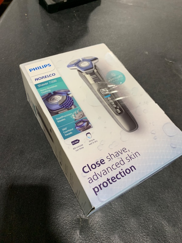 Photo 1 of Philips Norelco Shaver 7200, Rechargeable Wet & Dry Electric Shaver with SenseIQ Technology and Pop-up Trimmer, S7887/82