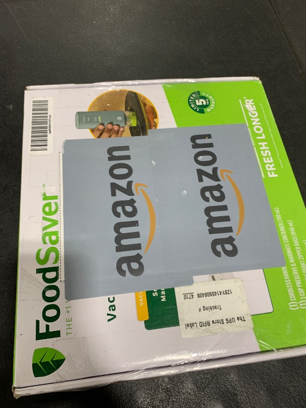 Photo 1 of FoodSaver Mini Handheld Vacuum Sealer Machine with Marinate Setting & Charging Dock | Cordless Food Vacuum Sealer for Freezer, Storage, Sous Vide, Meal Prep | Blue