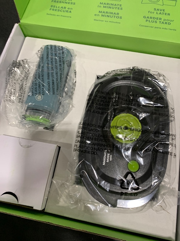 Photo 1 of FoodSaver Mini Handheld Vacuum Sealer Machine with Marinate Setting & Charging Dock | Cordless Food Vacuum Sealer for Freezer, Storage, Sous Vide, Meal Prep | Blue