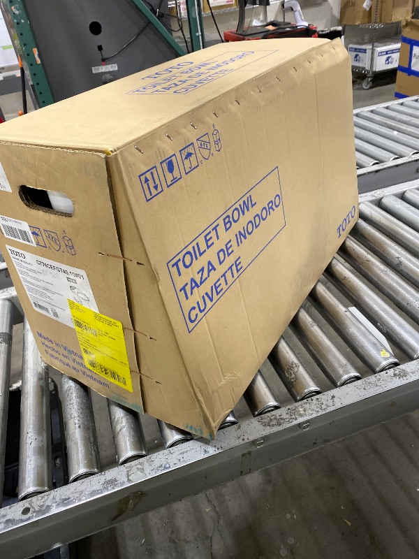 Photo 1 of TOTO® Drake® Two-Piece Elongated 1.28 GPF Universal Height TORNADO FLUSH ® Toilet with 10 Inch Rough-In, CEFIONTECT®, and SoftClose® Seat, WASHLET®+ Ready, Cotton White - MS776124CEFG.10#01 (JUST THE TOILET BOWL )