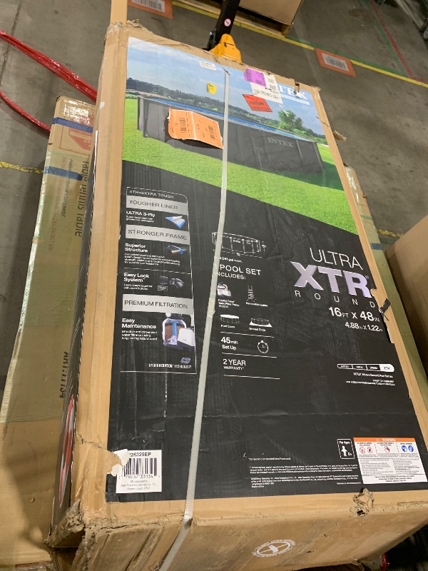 Photo 1 of INTEX 26325EP 16ft X 48in Ultra XTR Frame Deluxe Above Ground Swimming Pool Set with 1500 GPH Sand Filter Pump, Removable Ladder, Ground Cloth, Pool Cover, SuperTough, Puncture and Rust Resistant