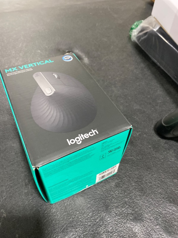 Photo 1 of Logitech MX Vertical Wireless Mouse – Ergonomic Design Reduces Muscle Strain, Move Content Between 3 Windows and Apple Computers, Rechargeable, Graphite