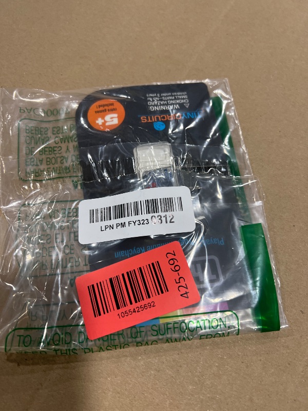 Photo 1 of TinyCircuits Thumby Programmable Game Console Keychain – Retro Gaming Fun Mini-Console, STEM Learning, USB Rechargeable, 5 Preloaded Games (Gray)