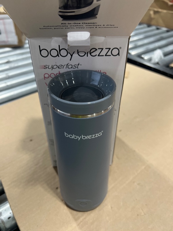 Photo 1 of Baby Brezza Portable Warmer – 3X Faster Baby Bottle Warming - Travel Breastmilk and Formula Warmer - Safe, Even Heating - Up to 9oz - No Adapters, Grey