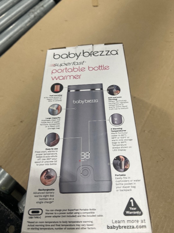 Photo 1 of Baby Brezza Portable Warmer – 3X Faster Baby Bottle Warming - Travel Breastmilk and Formula Warmer - Safe, Even Heating - Up to 9oz - No Adapters, Grey