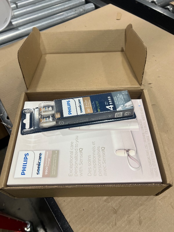 Photo 1 of Philips Sonicare DiamondClean Prestige 9900 Rechargeable Electric Toothbrush with SenseIQ, 5 Premium All-in-One Brush Heads, Plaque Removal, Gum Care, Whitening, Champagne, BD9001AZ