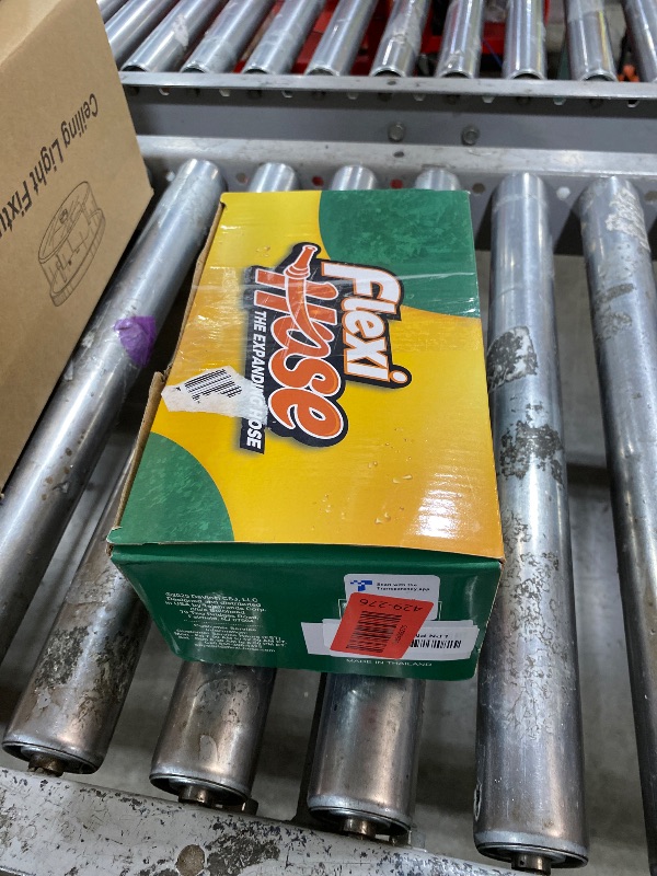 Photo 1 of Flexi Hose Plus Expandable Garden Hose with 8 Function Nozzle, 25FT - Lightweight Retractable Garden Hose, Water Hose - No-Kink Flexibility, 3/4 Inch Solid Brass Fittings Includes Hook & Bag