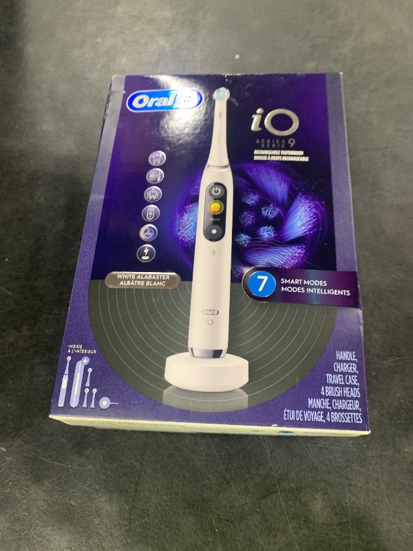 Photo 1 of Oral-B Rechargeable Electric Toothbrush, iO9 Genius, 7 Cleaning Modes, Interactive Display, Charging Travel Case, Visible Pressure Sensor, 4 Brush Heads, White Alabaster