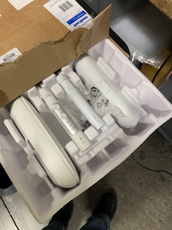 Photo 1 of see photos for reference =======Philips Sonicare DiamondClean Connected Electric Toothbrush 2 Pack, x2 Sonic Toothbrushes, x2 Charging Travel Cases, x2 A3 Brush Heads, 12 Brushing Settings, (Black and Rose Gold) Model HX9912/71