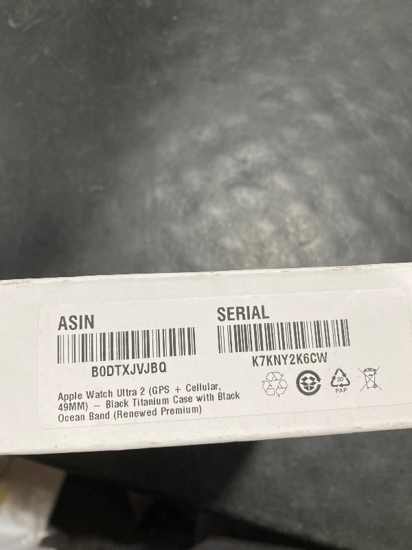 Photo 1 of Apple Watch Ultra 2 (GPS + Cellular, 49MM) - Black Titanium Case with Black Ocean Band (Renewed Premium)