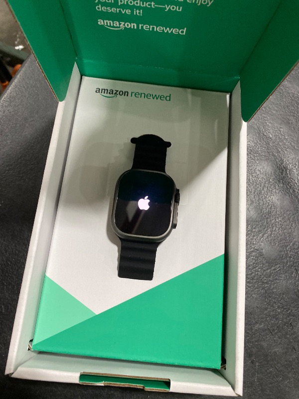 Photo 1 of Apple Watch Ultra 2 (GPS + Cellular, 49MM) - Black Titanium Case with Black Ocean Band (Renewed Premium)