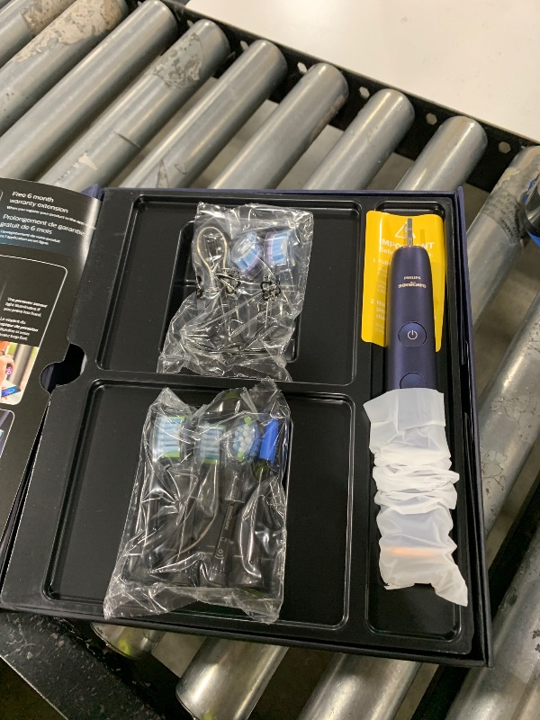 Photo 1 of Philips Sonicare DiamondClean Smart 9700 Electric Toothbrush, Sonic Toothbrush with App, Pressure Sensor, Brush Head Detection, 5 Brushing Modes and 3 Intensity Levels, Lunar Blue, Model HX9957/71