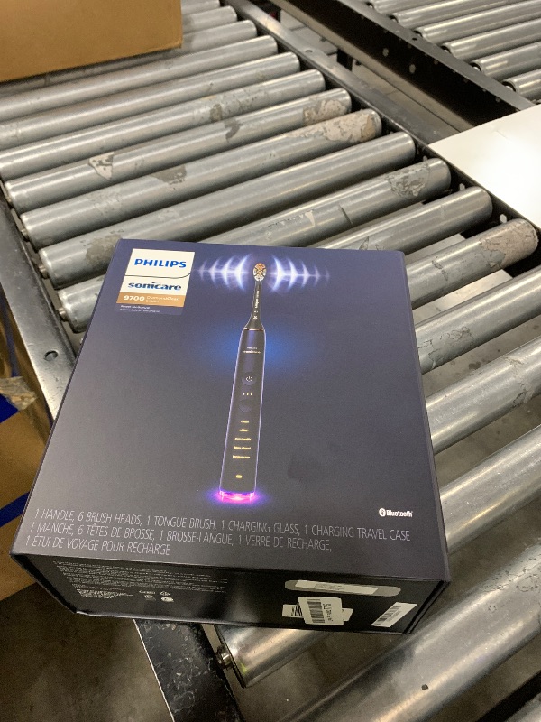 Photo 1 of Philips Sonicare DiamondClean Smart 9700 Electric Toothbrush, Sonic Toothbrush with App, Pressure Sensor, Brush Head Detection, 5 Brushing Modes and 3 Intensity Levels, Lunar Blue, Model HX9957/71