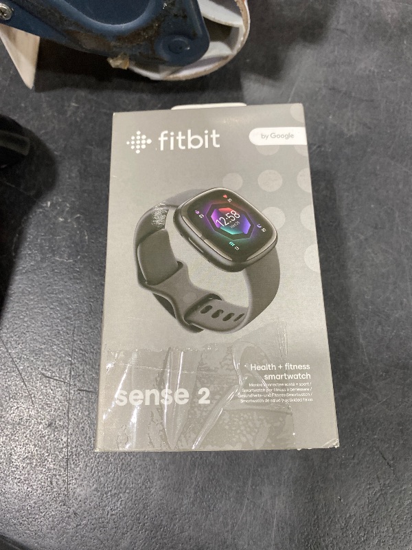 Photo 1 of Fitbit Sense 2 Advanced Health and Fitness Smartwatch with Tools to Manage Stress and Sleep, ECG App, SpO2, 24/7 Heart Rate and GPS, Shadow Grey/Graphite, One Size (S & L Bands Included)