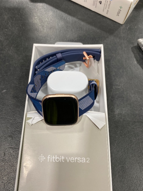 Photo 1 of Fitbit Versa 2 Special Edition Health and Fitness Smart Watch with Heart Rate, Music, Alexa Built-In, Sleep and Swim Tracking, Navy and Pink Woven/Copper Rose, One Size (S and L Bands Included), 2.3