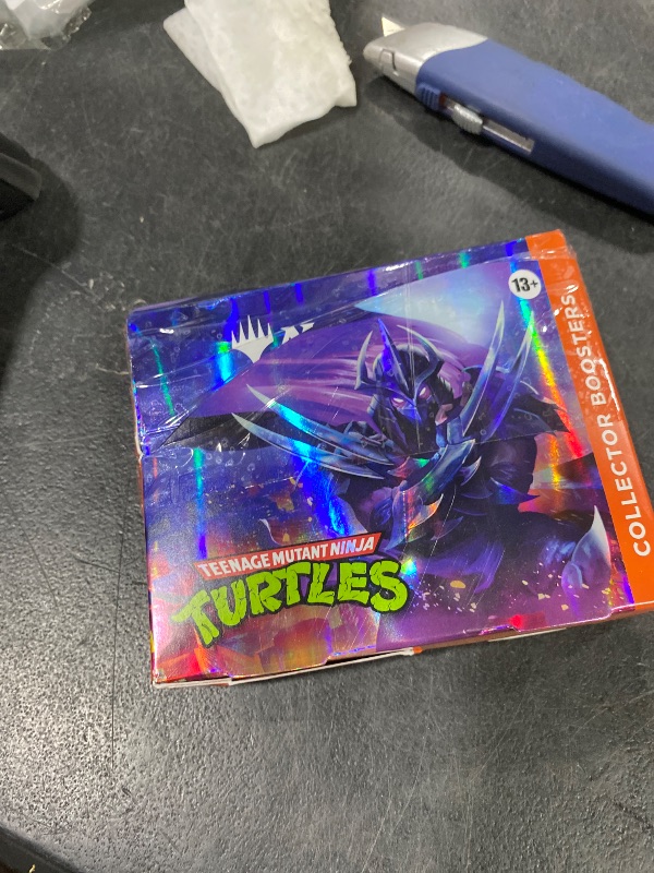 Photo 1 of Magic: The Gathering | Teenage Mutant Ninja Turtles - Collector Booster Box | 12 Packs | Collectible Trading Card Game