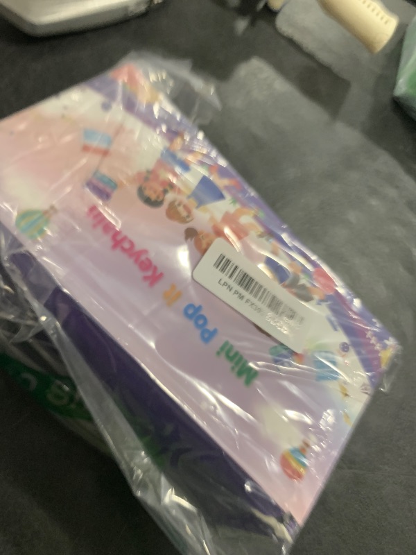 Photo 1 of 100 PCS Mini Pop Fidget Toys Pack Party Favors, Easter Silicone Squeeze Pop Bubble Fidget Bulk Sensory Toys, Pop Keychain Bubble Toy Party Bag Fillers for Kids, Wrap Pop Toy