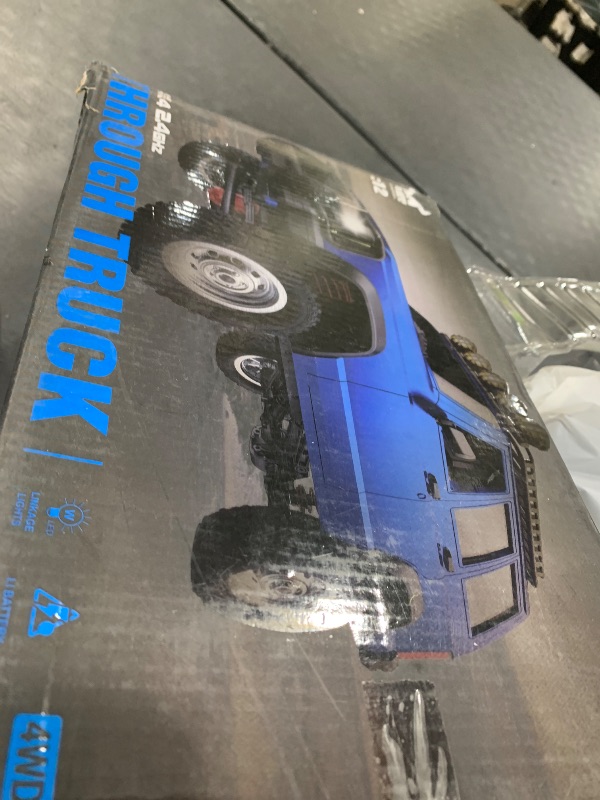 Photo 1 of GoolRC RC Rock Crawler, 1:12 Scale Remote Control Car, 2.4Ghz 4WD Off Road RC Truck, All Terrains Climbing Vehicle, RC Car Gifts for Adults, Include 2 Batteries (Silver)