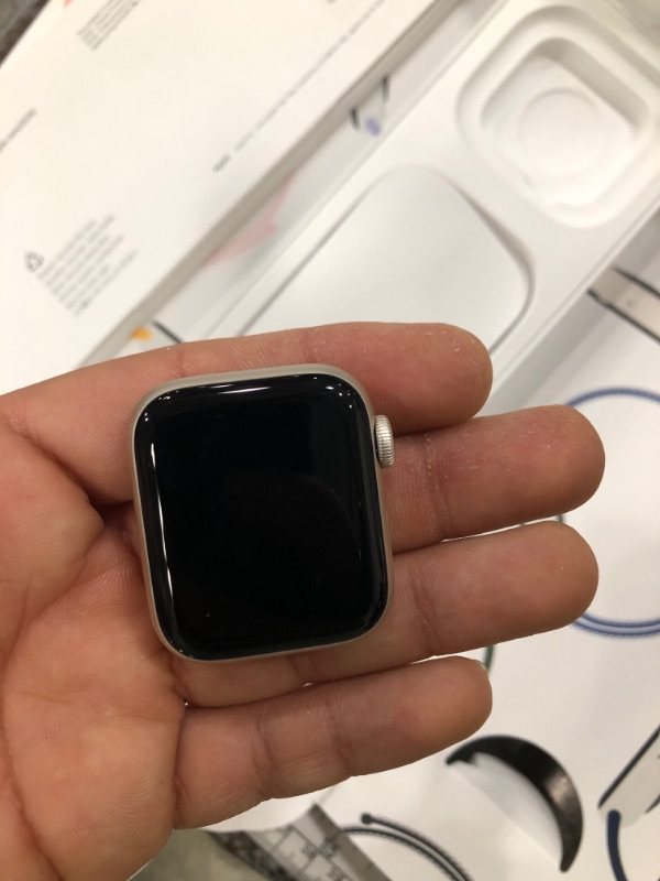 Photo 1 of **FOR PARTS ONLY**
Apple Watch SE (2nd Gen) [GPS + Cellular 40mm] Smartwatch with Starlight Aluminum Case with Lake Green Sport Loop One Size. Fitness and Sleep Trackers, Crash Detection, Carbon Neutral