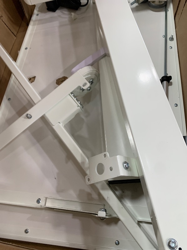 Photo 1 of **FOR PARTS ONLY**
Broken underneath the table ******Liftsync 35inch Glass Standing Desk?90° Tiltable Mobile Rising Desk Height Adjustable?Whole Piece Rolling Sit Stand Table with Wheels?Foldable Small Laptop Desk?White