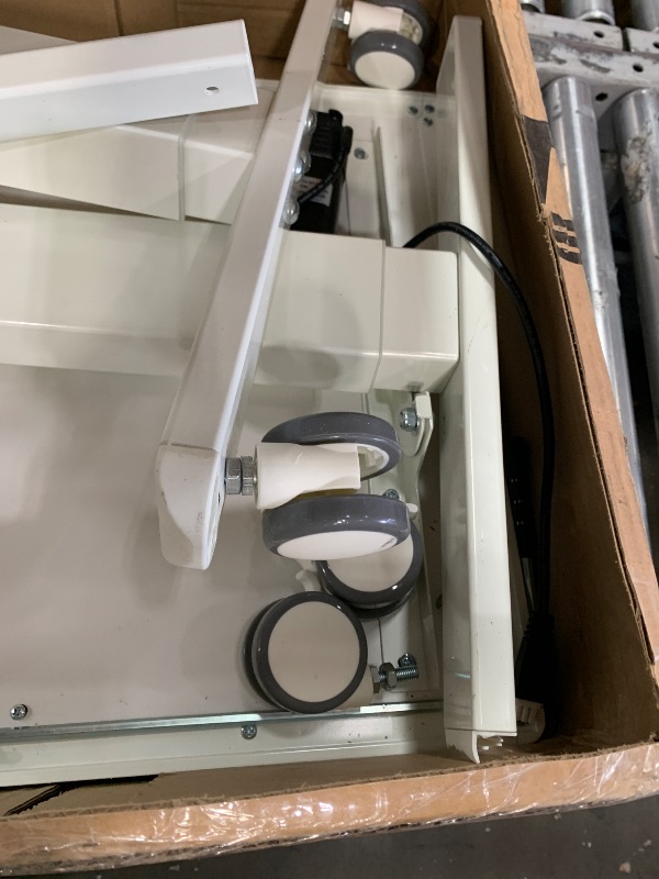 Photo 1 of **FOR PARTS ONLY**
Broken underneath the table ******Liftsync 35inch Glass Standing Desk?90° Tiltable Mobile Rising Desk Height Adjustable?Whole Piece Rolling Sit Stand Table with Wheels?Foldable Small Laptop Desk?White