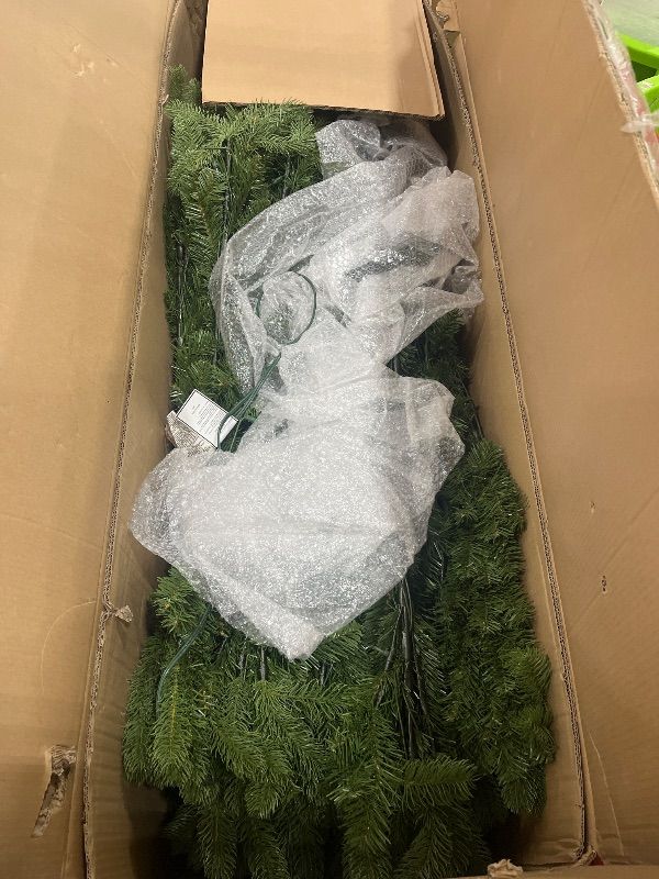 Photo 1 of **INCOMPLETE/SEE NOTES** National Tree Company Pre-Lit 'Feel Real' Artificial Giant Full Downswept Christmas Tree, Green, Douglas Fir, White Lights, Includes Stand, 12 feet