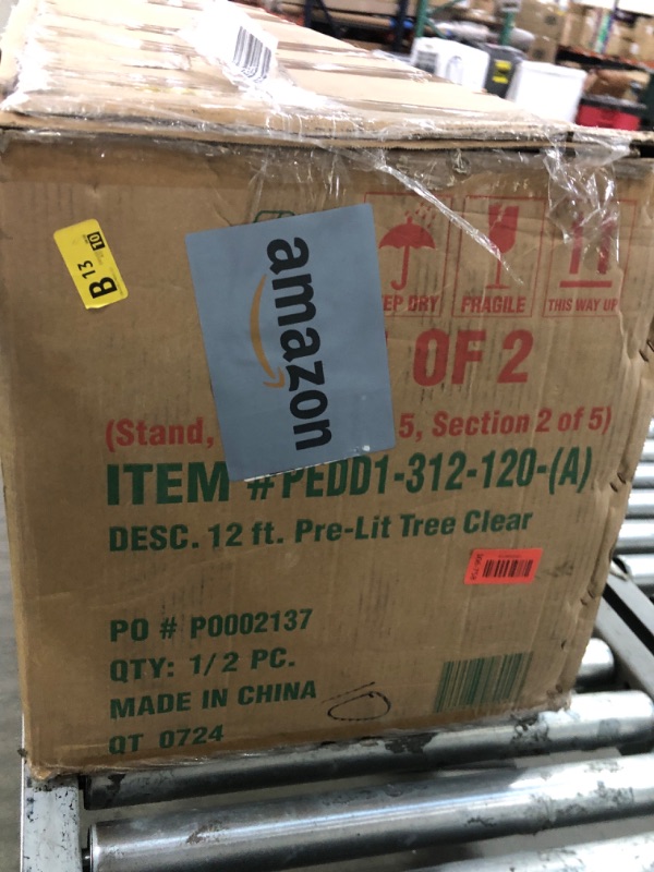 Photo 1 of **INCOMPLETE/SEE NOTES** National Tree Company Pre-Lit 'Feel Real' Artificial Giant Full Downswept Christmas Tree, Green, Douglas Fir, White Lights, Includes Stand, 12 feet