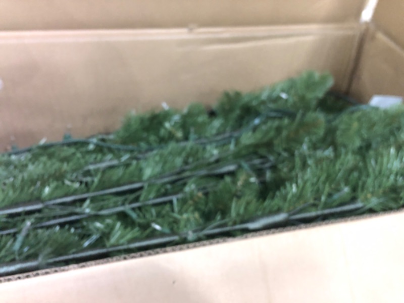 Photo 1 of **INCOMPLETE/SEE NOTES** National Tree Company Pre-Lit 'Feel Real' Artificial Giant Full Downswept Christmas Tree, Green, Douglas Fir, White Lights, Includes Stand, 12 feet