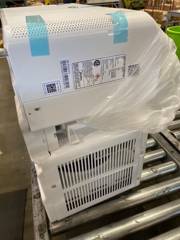 Photo 1 of (powers on) Midea 12,000 BTU U Shaped Smart Inverter Window Air Conditioner - Cools 550 Sq Ft, Ultra Quiet with Open Window Flexibility - Alexa/Google Assistant Compatible - 35% Energy Savings, Remote (Updated)