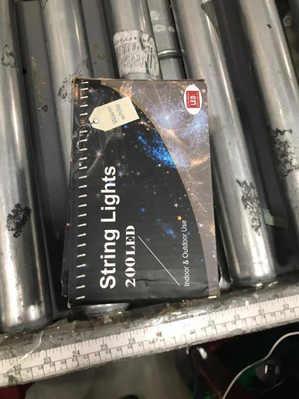 Photo 1 of Home Lighting 66ft Christmas Decorative Mini Lights, 200 LED Green Wire Fairy Starry String Lights Plug in, 8 Lighting Modes, for Indoor Outdoor Xmas Tree Wedding Party Decoration (Warm White)