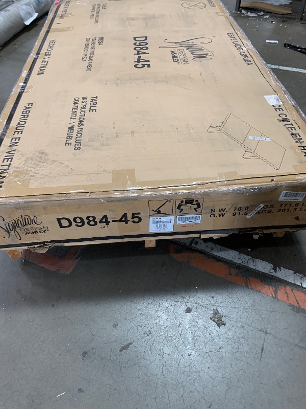 Photo 2 of Signature Design by Ashley Burkhaus Rectangle Dining Room Extension Table, Removable Center Leaf, Seats up to 8, Wood, 40" W x 90" D x 30.25" H, Dark Brown