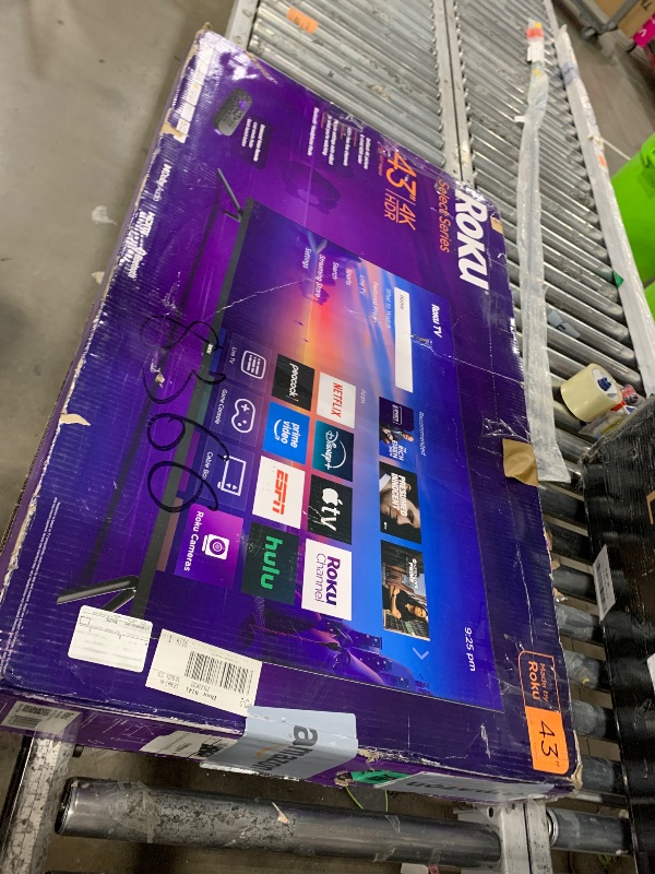 Photo 1 of **DAMAGE** Roku Smart TV 2025 – 43-Inch Select Series, 4K HDR TV – RokuTV with Enhanced Voice Remote – Flat Screen LED Television with Wi-Fi for Streaming Live Local News, Sports, Family Entertainment