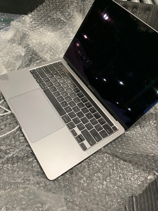 Photo 1 of Apple 2020 MacBook Pro with M1 Chip, 13-inch, 8GB RAM, 256GB SSD, Silver (Renewed)