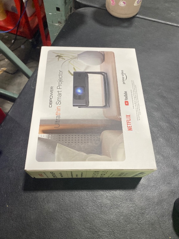 Photo 1 of [Ultra-Slim 1.97"| Netflix Licensed | AI Auto Focus | 360° Stand] Smart Mini Projector with WiFi 6 & Bluetooth, Built-in Netflix/YouTube/Disney+/Hulu, DBPOWER N5 Movie Projector for Bedroom (Black)