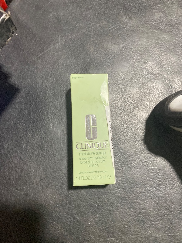 Photo 1 of Clinique Moisture Surge Sheertint Hydrator Hydrating Tinted Moisturizer Broad Spectrum SPF 25 With Hyaluronic Acid + Aloe Water For All Skin Types | Sheer Coverage, Natural Finish, Medium, 1.4 Fl Oz