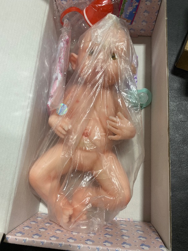 Photo 1 of SERENDOLL 18.5" Full Silicone Reborn Baby Doll Soft Solid Silicone Infant Soft Body Dolls That Look Real,Not Hollow Vinyl Dolls,Bald Girl 016