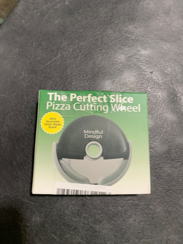 Photo 1 of Mindful Design Pizza Cutter Wheel with Protective Blade Cover, Easy to Clean and Dishwasher Safe Handheld Pizza Slicer