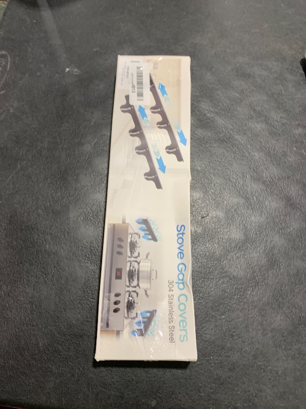 Photo 1 of Stove Gap Covers - 304 Stainless Steel Oven Side Gap Filler, 2 Pack Stove Gap Filler Retractable Length 13.8" to 27.5", Spring Clip Design Fitting Gap Strong Guard Between Stove Top & Counter - Black