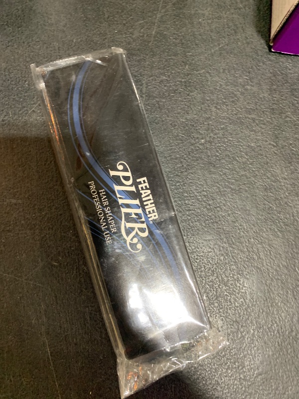 Photo 1 of Feather Plier Hair Razor with Folding Handle