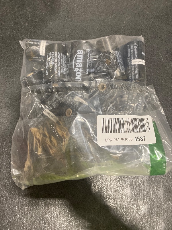 Photo 1 of Amazon Basics Dog Poop Bags with Dispenser, 300 Count, Enhanced for Guaranteed Leakproof, Unscented, Includes Leash Clip