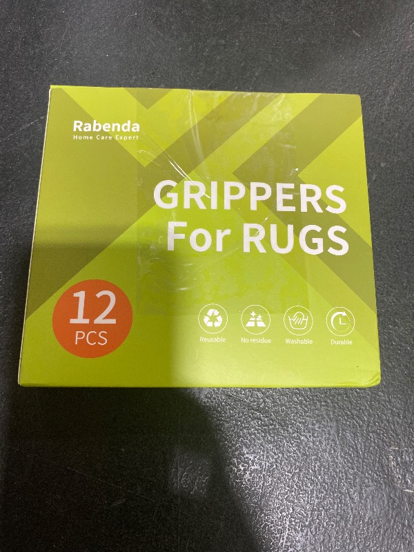 Photo 1 of Rabenda 12 Pcs Rug Tape, Non Slip Rug Pads Grippers for Hardwood Floors and Tiles, Reusable Carpet Tape for Area Rugs, Double-Sided Adhesive Rug Stickers Keep Corners Flat (Black)
