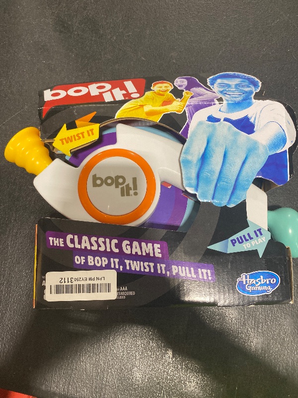 Photo 1 of Hasbro Gaming Bop It! Electronic Game for Kids Ages 8 and up, Kids Games for 1 or More Players, Board Games for Kids, Kids Gifts