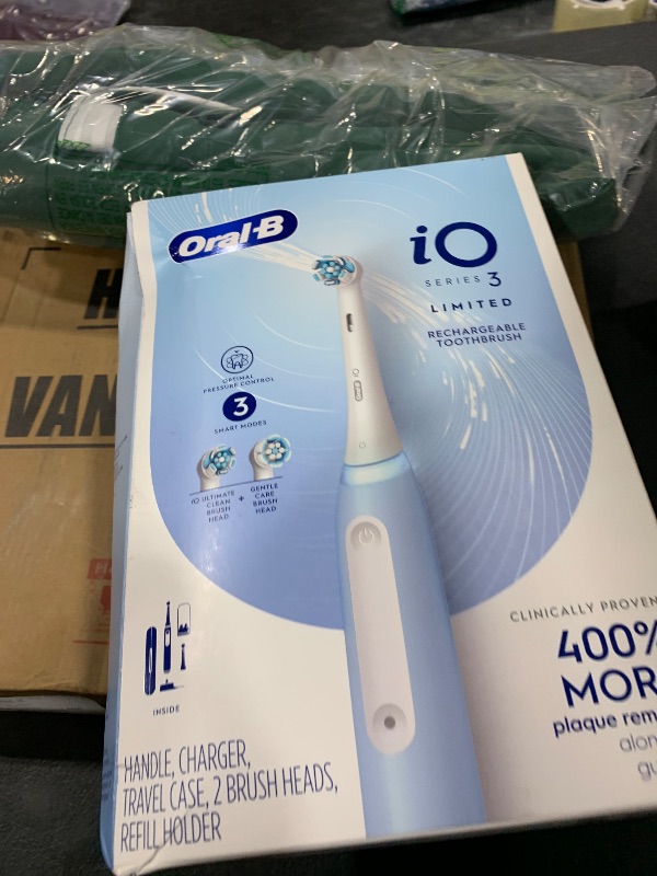 Photo 1 of Oral-B iO Deep Clean Rechargeable Electric Powered Toothbrush, Icy Blue with iO Series 3 Limited, 2 Brush Heads and Travel Case - Pressure Sensor to Protect Gums - 3 Cleaning Settings - 2 Minute Timer