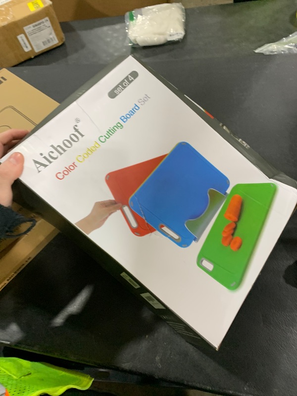 Photo 1 of Plastic Cutting Board, Set of 4 with Storage Stand, Color Box Packed, BPA-Free, Preventing Cross-contamination of Different Food Types, Dishwasher Safe