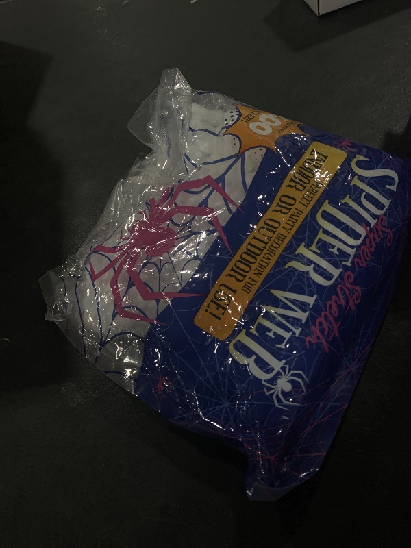 Photo 1 of 1400 sqft Halloween Spider Webs Decorations with 150 Extra Fake Spiders, Super Stretchy Cobwebs for Halloween Decor Indoor and Outdoor