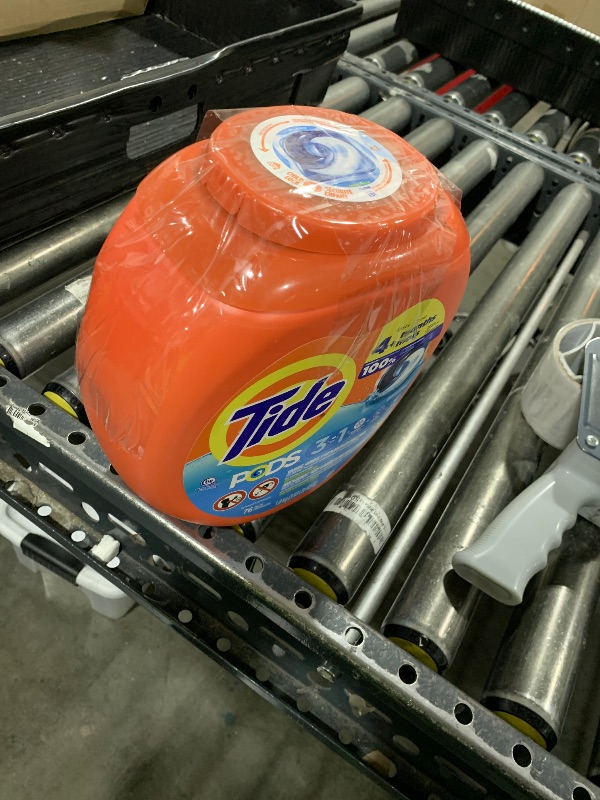 Photo 1 of Tide PODS Liquid Laundry Detergent Soap Pacs HE Compatible 76 Count Powerful 3-in-1 Clean in one Step Clean Breeze Scent