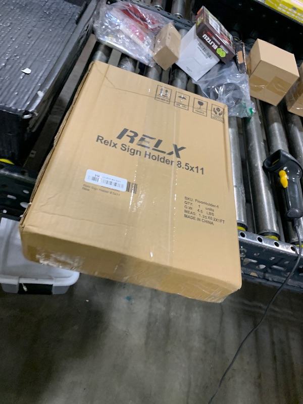 Photo 1 of Relx Sign Holder Stand 8.5x11 inch - Adjustable Floor Standing Sign Holder - Signage Stand with Snap-Open Frame Display for Malls,Schools,Restaurants